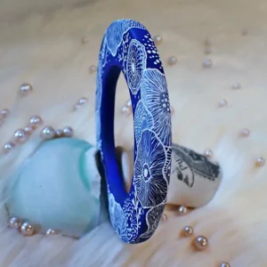 Art bangle nature inspired organic form double-sided continuous artwork handcrafted polymer clay contemporary wearable