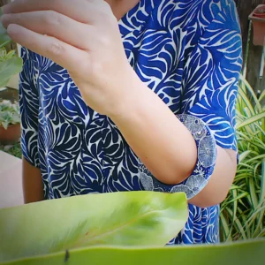 Art bangle nature inspired organic form double-sided continuous artwork handcrafted polymer clay contemporary wearable